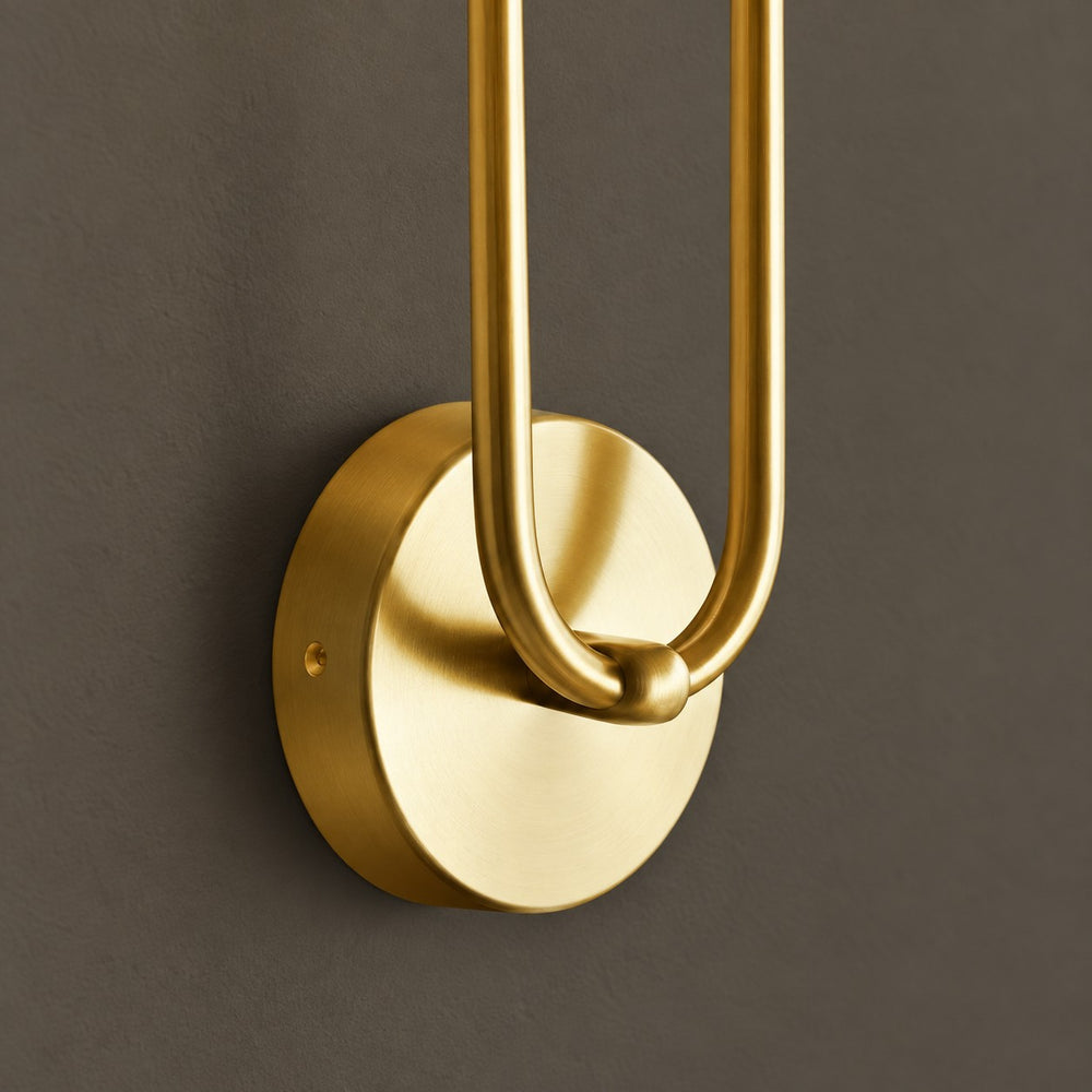 Applique dorée — détail fixation
